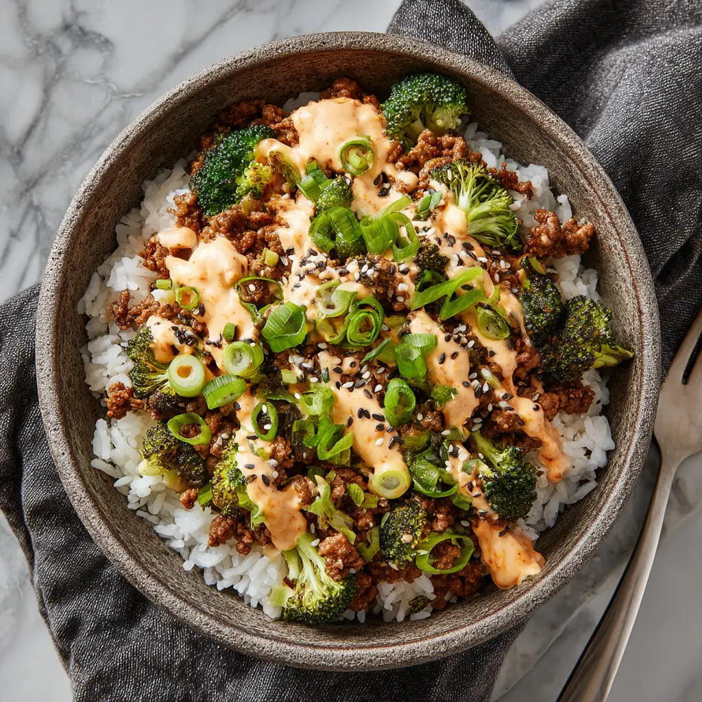 Another angle of the easy ground beef recipe, showing the fluffy rice underneath the beef and broccoli mixture. A healthy and quick weeknight dinner idea.