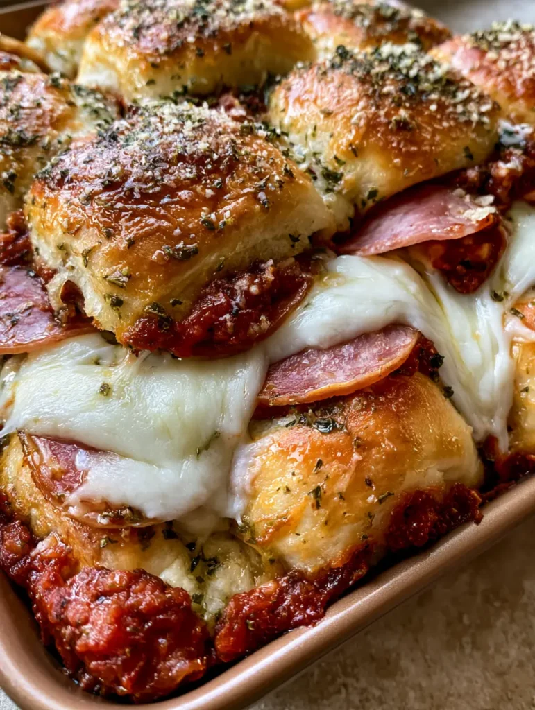 Close-up of Easy Pizza Sliders showing the rich, chunky red tomato sauce and thick melted white mozzarella.