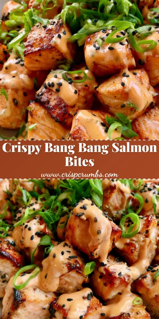 A close-up of crispy Bang Bang Salmon Bites in a white bowl with pale orange sauce, green scallions, and black sesame seeds.